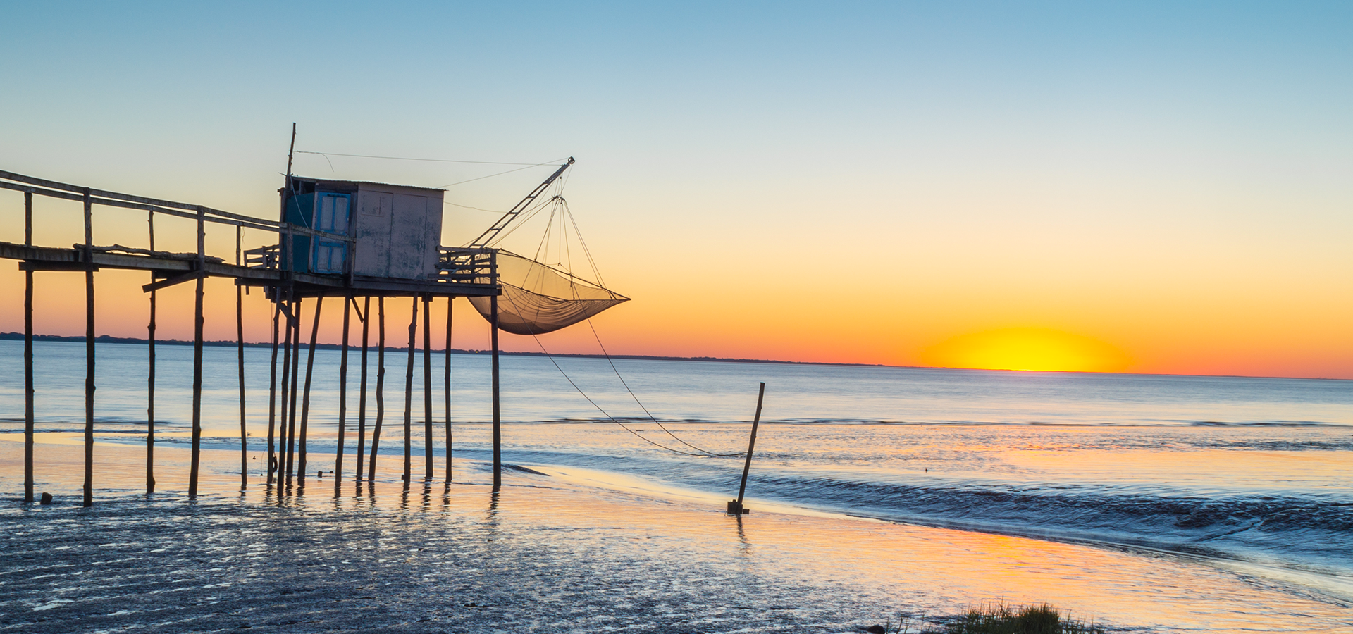 Spiaggia della Charente-Maritime al tramonto